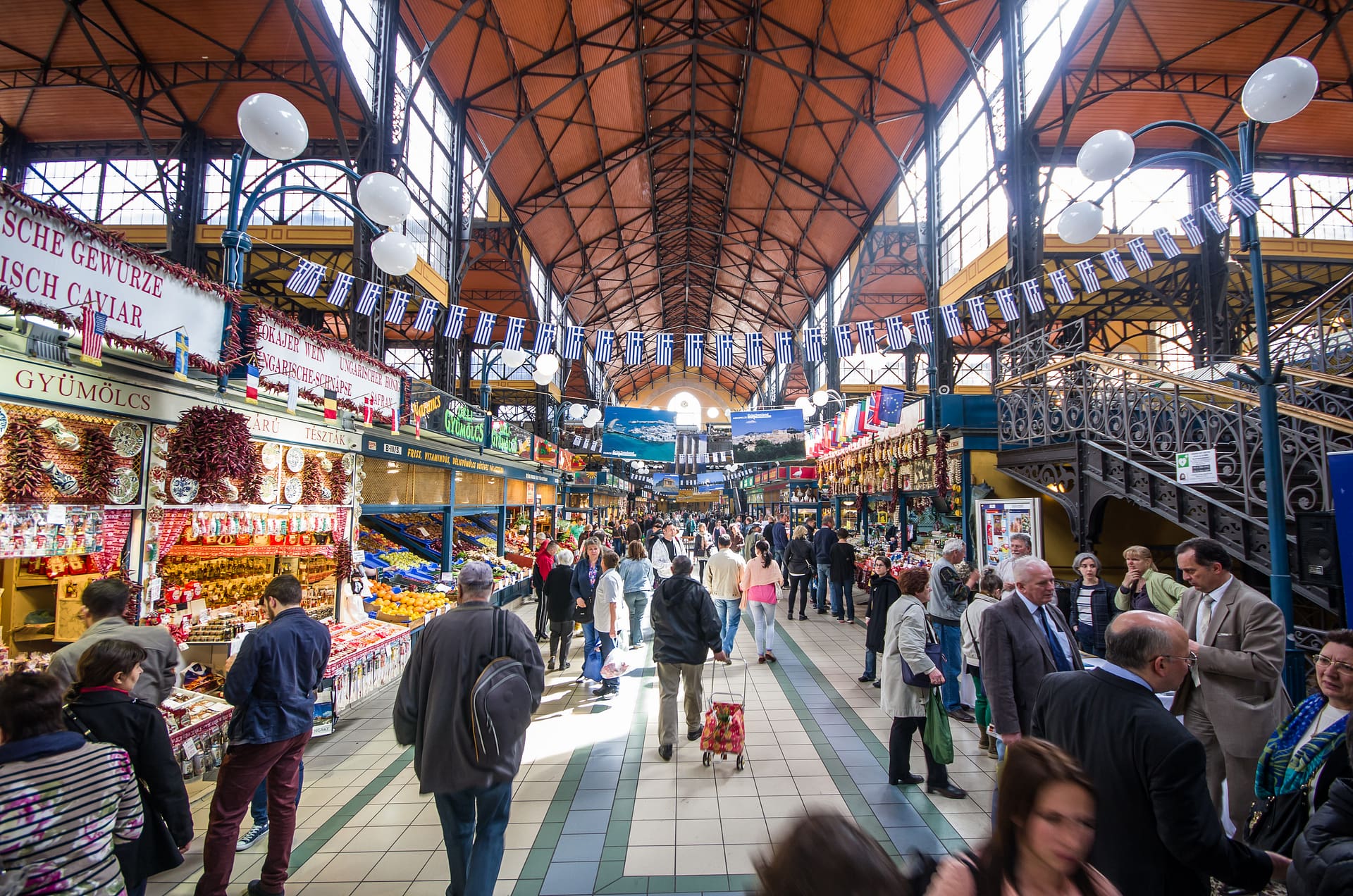 Browse for goods and snacks at Budapest's Great Market Hall Visitors inside the Great Market Hall (Nagycsarnok) in Budapest