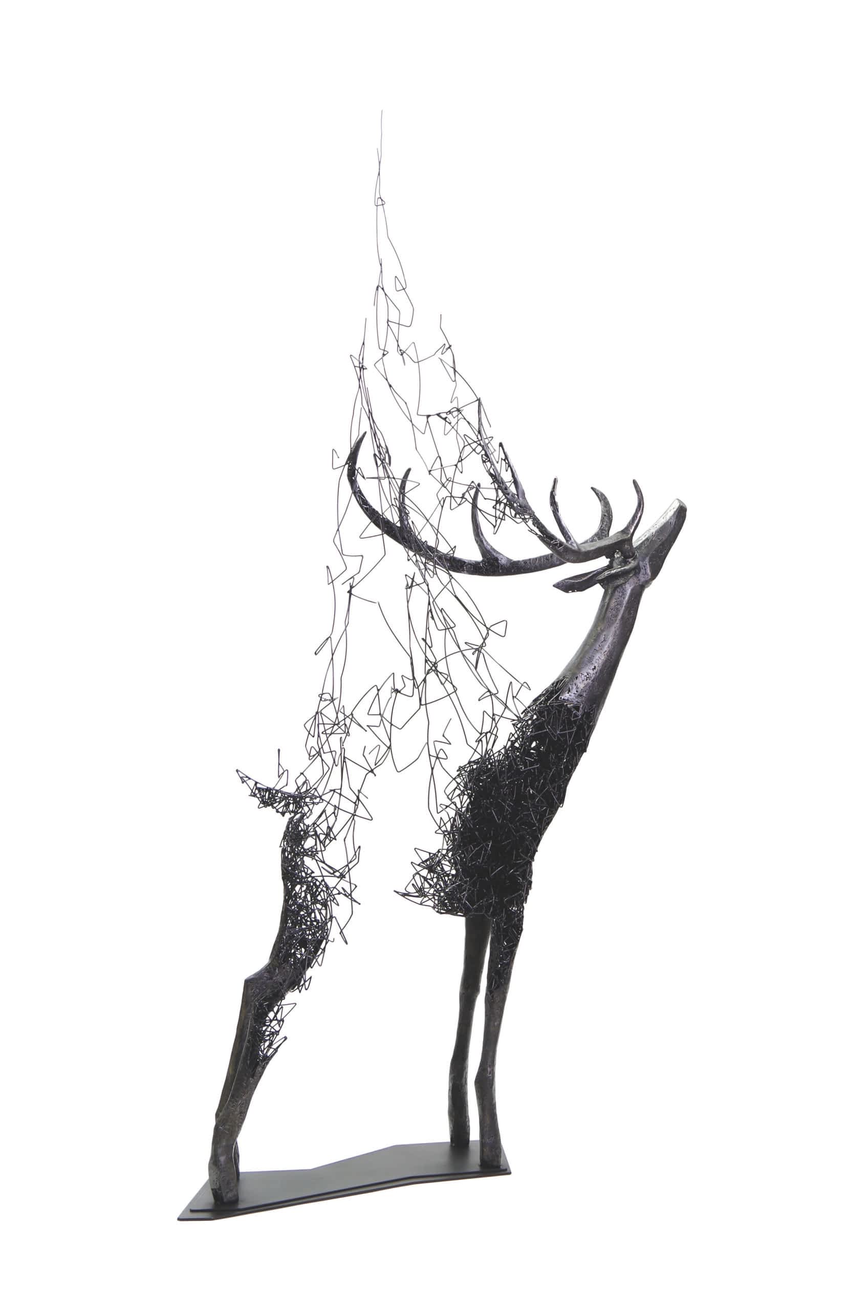 an abstract sculpture of a deer with its center missing and tendrils leading down the sky as if it is disintegrating upward