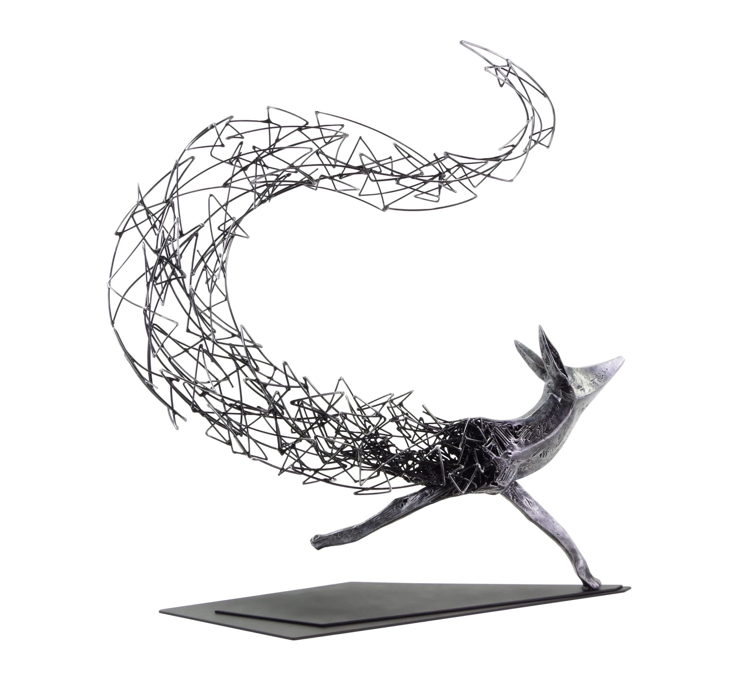 an abstract sculpture of a fox with its rear legs missing and tendrils spiraling up toward the sky as if it is disintegrating upward