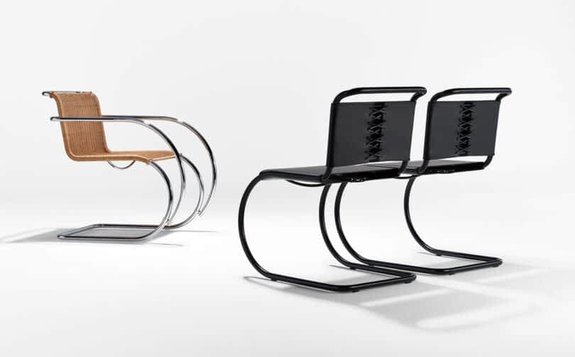 The image shows three modern cantilever chairs with curved metal frames. One chair has a woven seat and backrest, while the other two have sleek black seats and backrests. The background is plain white.