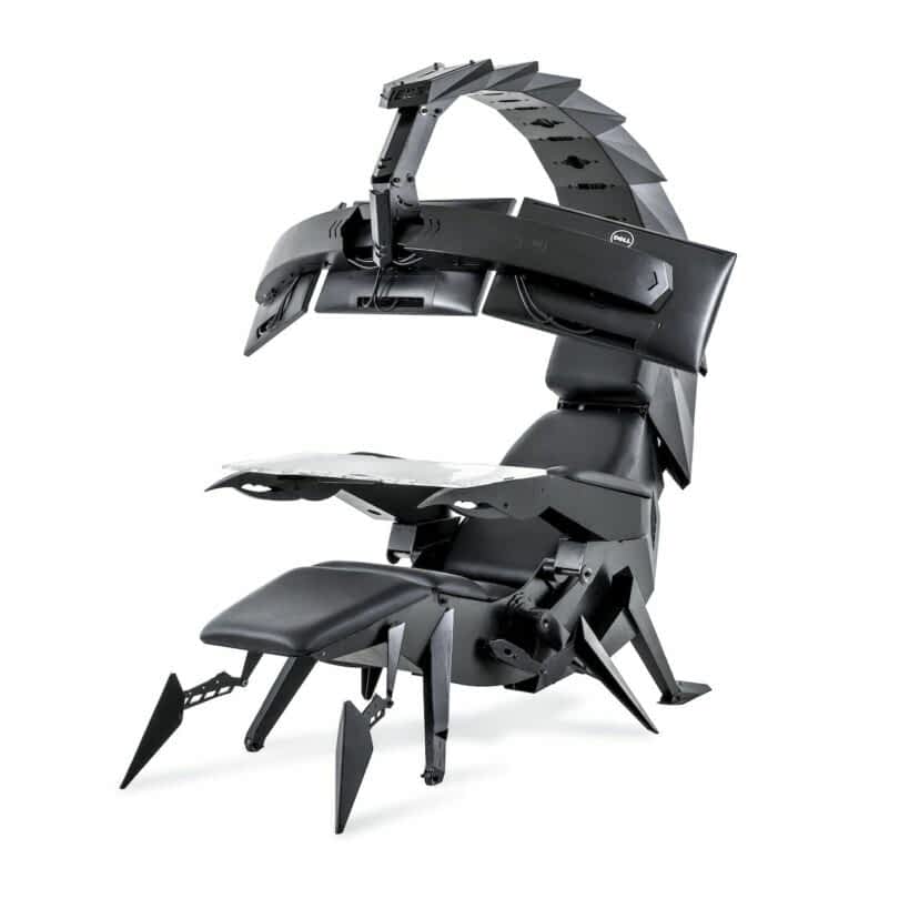 High-tech, black scorpion-inspired workstation with an adjustable ergonomic chair, multiple monitor mounts, and a retractable desk surface