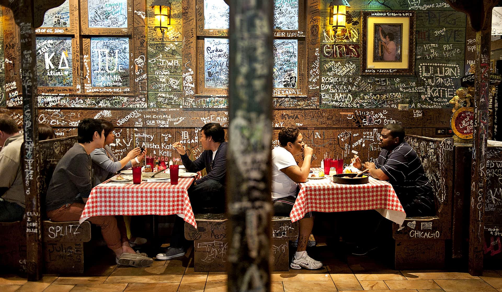 Gino's East is a Chicago institution. Customers sit in the dining room at Gino's East restaurant in Chicago, Illinois.