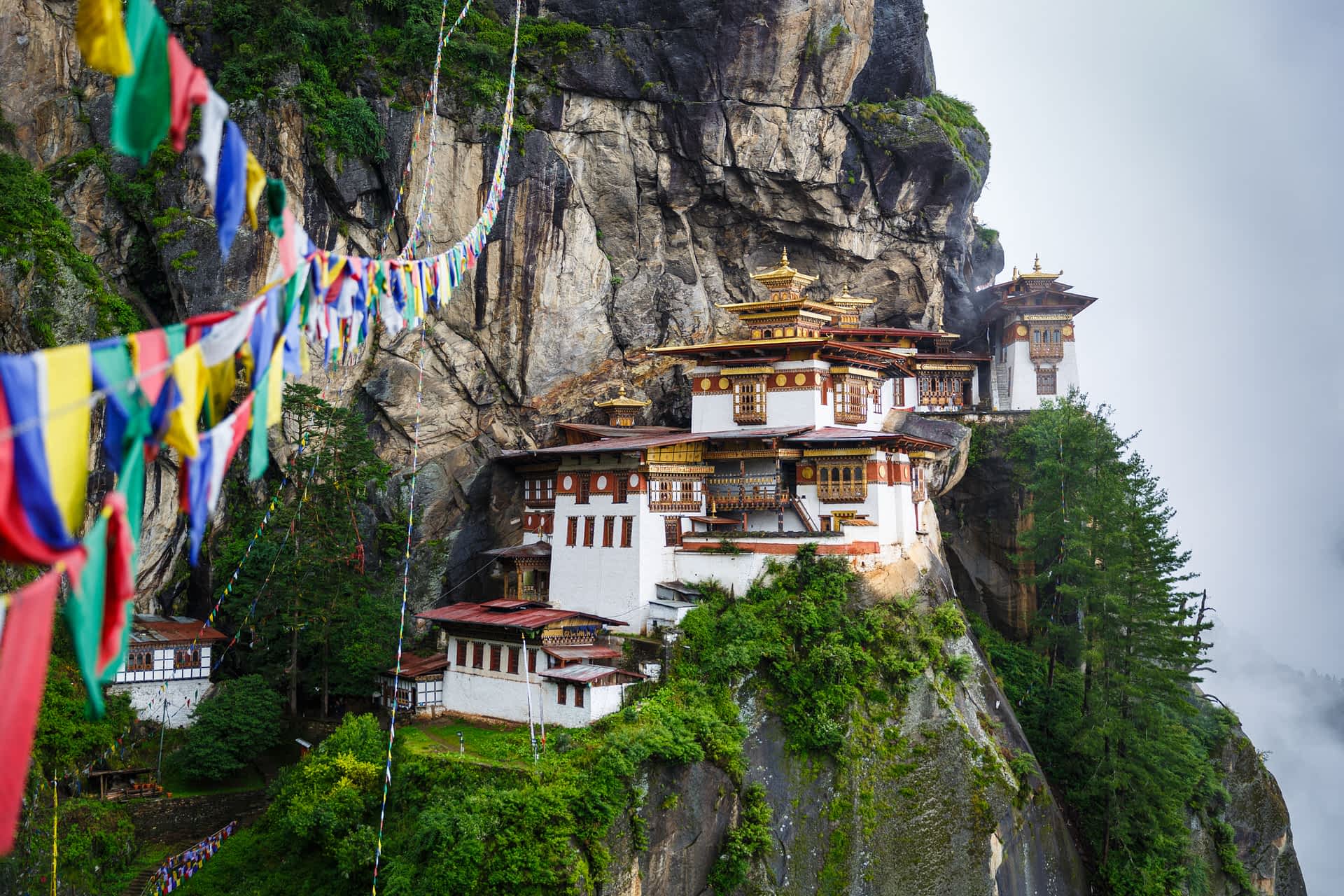 Taktsang (Tiger’s Nest) Monastery, Bhutan Taktsang (Tiger’s Nest) Monastery, near Paro, Bhutan, a white building clinging to the side of a sheer rock face