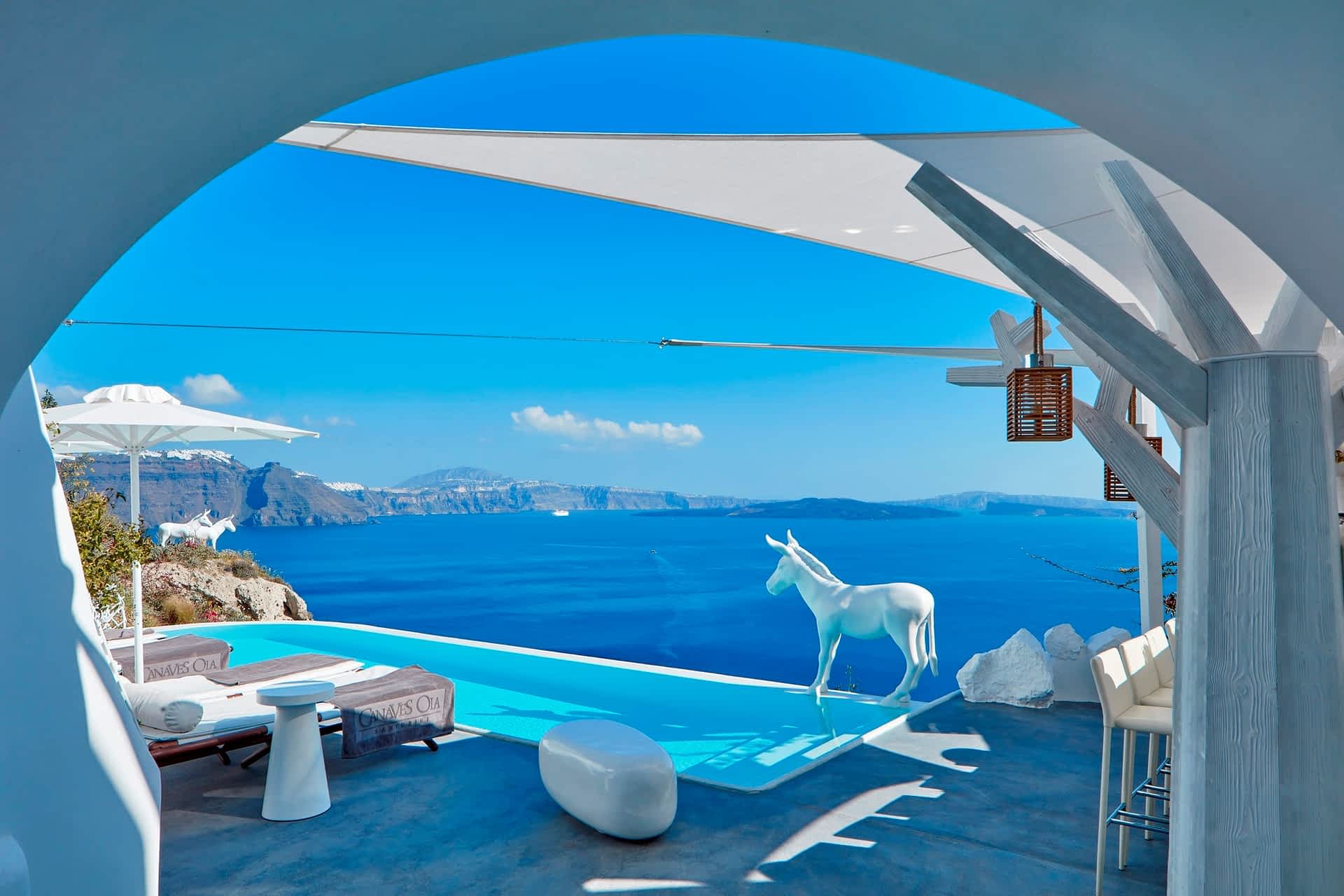 The infinity pool at the Canaves Oia Boutique Hotel, Santorini, Greece The infinity pool at the Canaves Oia Boutique Hotel, Santorini, Greece
