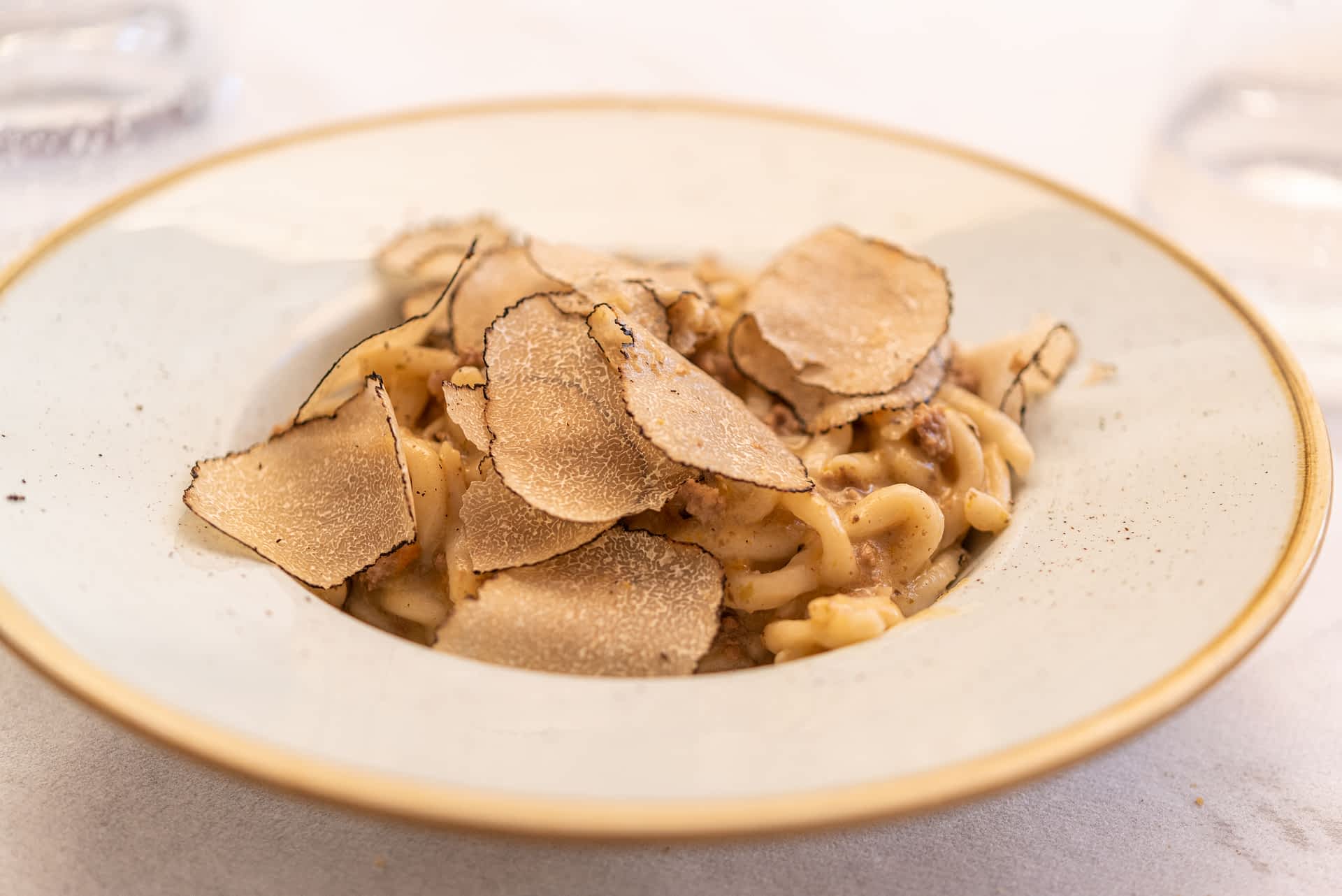 Pasta with truffles in Umbria A bowl of pasta with truffles and wild boar ragu