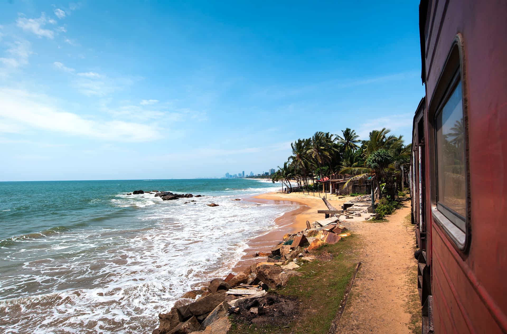 GettyRF1143314185.jpg Coastal train scenic view in Sri Lanka