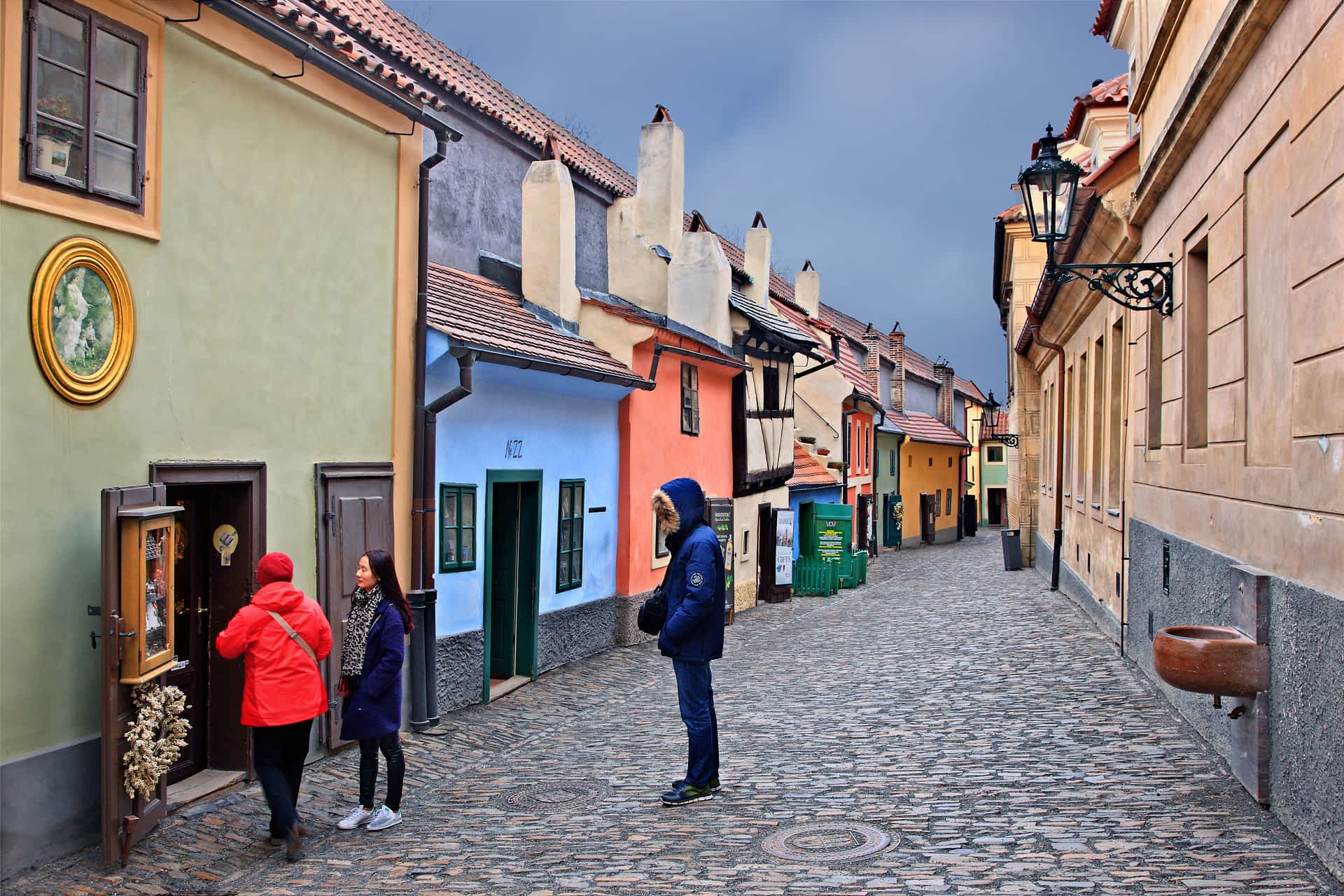 Golden Lane, Prague Castle, Prague, Czech Republic Tourists look at the historic houses along Golden Lane, Prague Castle, Prague, Czech Republic