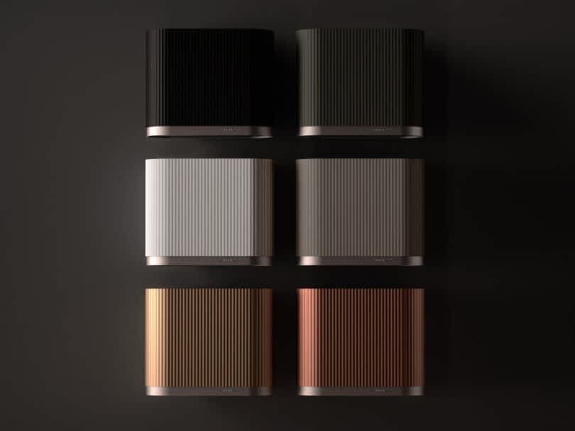 Six Mono kitchen hood filters by Ciarko Design arranged in two rows of three, featuring varying colors and ribbed textures on a dark background.