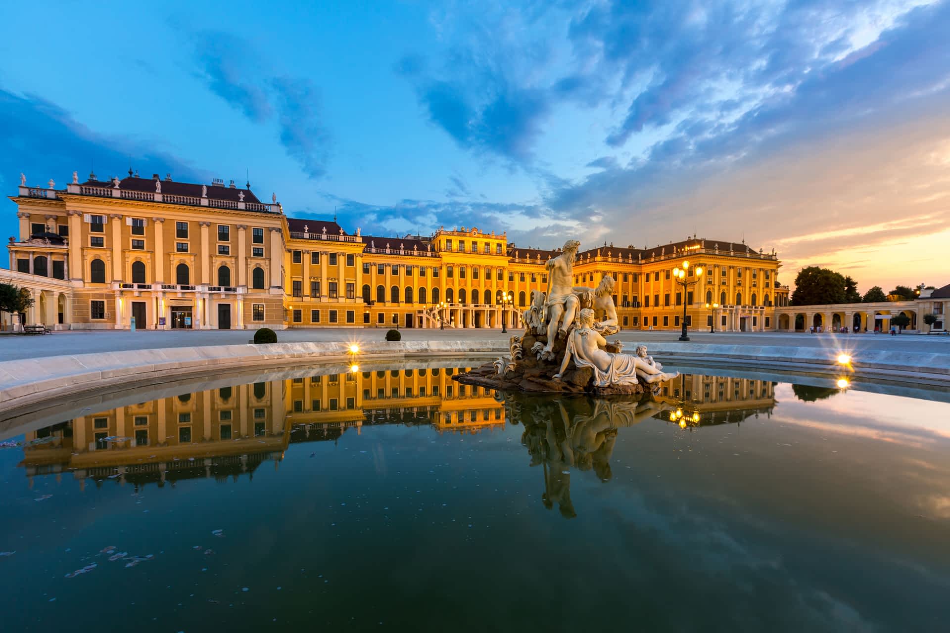 Schönbrunn Palace, Vienna, Austria Sculptures at Schönbrunn Palace at sunset, Vienna, Austria